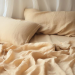 How do natural dyes enhance the uniqueness of organic duvet covers?